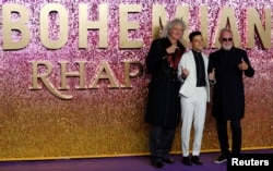 Actor Rami Malek and members of Queen Roger Taylor and Brian May attend the world premiere of 'Bohemian Rhapsody' movie in London, Britain October 23, 2018.