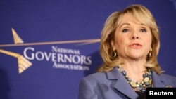 FILE - Oklahoma Republican Governor Mary Fallin speaks before the opening of the National Governors Association Winter Meeting in Washington, Feb. 22, 2014. Fallin vetoed abortion legislation in her state Friday, saying it would not withstand a court challenge. 