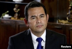 Jimmy Morales looks on during an interview with Reuters in Guatemala City, Aug. 20, 2015.