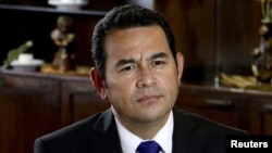 Jimmy Morales, Guatemala's independent presidential candidate, looks on during an interview with Reuters in Guatemala City, Aug. 20, 2015. 