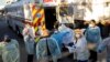 အမေရိကန် တက္ကဆက်ပြည်နယ်တွင် ကိုရိုနာဗိုင်းရပ်ကြောင့်သေဆုံးများသယ်ဆောင်လာစဉ် (နိုဝင်ဘာလ ၁၆၊၂ဝ၂ဝ)
