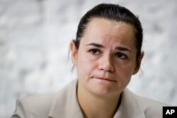 Sviatlana Tsikhanouskaya, candidate for the presidential elections, attends a news conference after the Belarusian presidential election in Minsk, Belarus, Monday, Aug. 10, 2020.