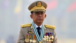 FILE PHOTO: Myanmar's junta chief Senior General Min Aung Hlaing, who ousted the elected government in a coup, presides at an army parade on Armed Forces Day in Naypyitaw, Myanmar, March 27, 2021.