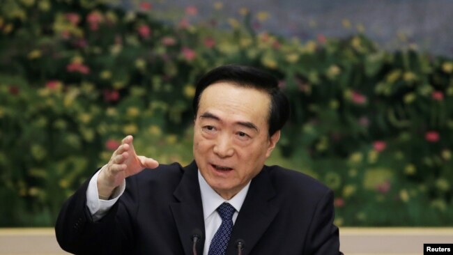 Chen Quanguo, Communist Party Secretary of Xinjiang Uighur Autonomous Region, speaks at the meeting of Xinjiang delegation on the sidelines of the National People's Congress, at the Great Hall of the People in Beijing, March 12, 2019.