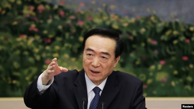 Chen Quanguo, Communist Party Secretary of Xinjiang Uighur Autonomous Region, speaks at the meeting of Xinjiang delegation on the sidelines of the National People's Congress, at the Great Hall of the People in Beijing, March 12, 2019.