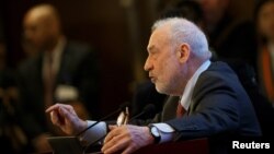 FILE - Columbia University Professor Joseph Stiglitz speaks at the China Development Forum in Beijing, March 24, 2019. 
