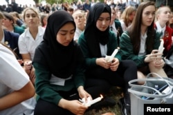 Students gather in a vigil to commemorate victims of Friday's shooting, outside Masjid Al Noor mosque in Christchurch, New Zealand March 18, 2019.
