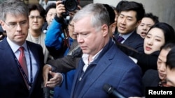 U.S. Special Representative for North Korea Stephen Biegun is surrounded by media upon his arrival to Incheon International Airport in Incheon, South Korea, Feb. 3, 2019. 