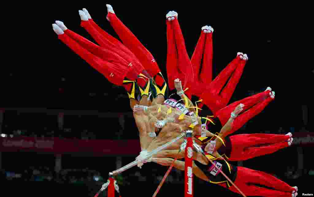 Marcel Nguyen of Germany competes in the horizontal bar during the men's individual all-around gymnastics final.