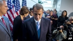 House Speaker John Boehner, R-Ohio, walks away from the microphone during a news conference after a House GOP meeting, Capitol Hill, Washington, Oct. 15, 2013.