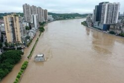 四川省内江市的沱江在连续的暴雨之后。（2020年8月18日）