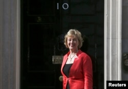FILE - Andrea Leadsom arrives at 10 Downing Street as Britain's re-elected Prime Minister David Cameron names his new Cabinet, in central London, Britain, May 11, 2015. Energy Minister Leadsom is a leading candidates to replace David Cameron as leader of