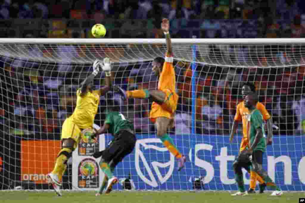 Zambia's goalkeeper Kennedy Mweene makes a save against Ivory Coast's Didier Drogba during their African Nations Cup final soccer match at the Stade De L'Amitie Stadium in Gabon's capital Libreville February 12, 2012.