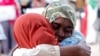 Des manifestants soudanais lors d'une manifestation silencieuse en mémoire des collègues perdus lors de la manifestation de sit-in près du quartier général militaire de Khartoum, au Soudan, le 22 août 2019. REUTERS / Mohamed Nureldin Abdallah - RC1949EEE210