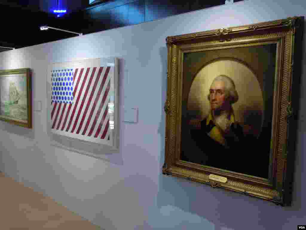 A portrait of George Washington, painted by Rembrandt Peale in 1859, next to Roy Lichtenstein’s "Forms in Space," from 1985. (VOA/J. Taboh) 