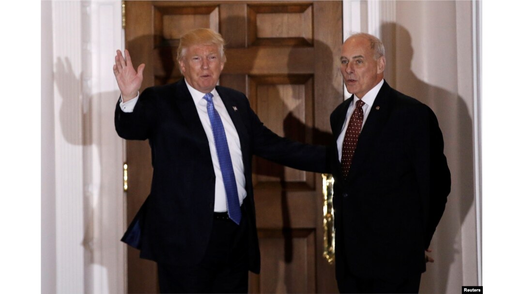 FILE - U.S. President-elect Donald Trump appears with retired Marine Corps General John Kelly outside the main clubhouse after their meeting at Trump National Golf Club in Bedminster, New Jersey, Nov. 20, 2016.