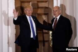 FILE - U.S. President-elect Donald Trump appears with retired Marine Corps General John Kelly outside the main clubhouse after their meeting at Trump National Golf Club in Bedminster, New Jersey, Nov. 20, 2016.