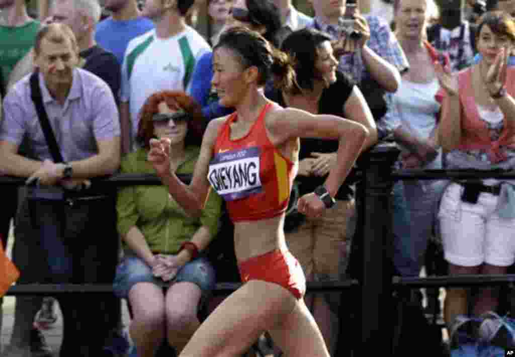 Choeying Kyi competes in the women&#39;s 20-kilometer race walk at the 2012 Summer Olympics, Saturday, Aug. 11, 2012, in London. Choeying won the bronze medal, Russia&#39;s Elena Lashmanova won the gold medal and Russia&#39;s Olga Kaniskina won the silver