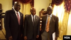 Vice President Joseph Boakai with Liberian Ambassador to the United States Jeremiah Sulunteh and VOA's James Butty.