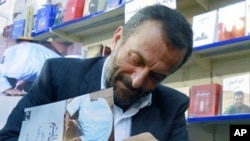 Hazem al-Amin signs copies of his new book, "The Lonely Salafist" in Beirut. The book aims to prove that the loss of national identity among the Palestinian diaspora has been an important factor in shaping al-Qaida.