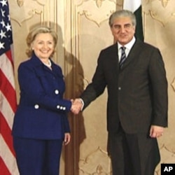 Hillary Clinton and Shah Mahmood Qureshi.