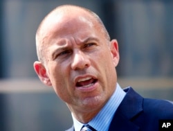 FILE - Michael Avenatti, the attorney for porn actress Stormy Daniels, talks to the media during a news conference in front of the U.S. Federal Courthouse in Los Angeles, July 27, 2018.