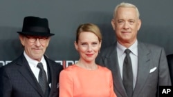Director Steven Spielberg, actress Amy Ryan and actor Tom Hanks, from left, arrive for the International Premiere of the movie 'Bridge of Spies' in Berlin, Germany, Nov. 13, 2015.