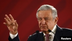 Mexico's President Andres Manuel Lopez Obrador gestures during a news conference at the National Palace in Mexico City, Mexico, April 15, 2019.