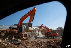 Work is under way on a new housing project in the West Bank settlement of Modin ilit, Jan. 1, 2019.