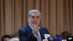 Afghanistan's presidential candidate Abdullah Abdullah speaks during a news conference in Kabul, Afghanistan, June 15, 2014. 