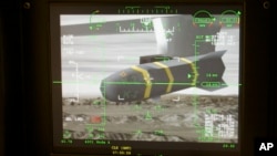 FILE - An unmanned aerial vehicle's Predator Hellfire missile is shown on a simulator's virtual camera.