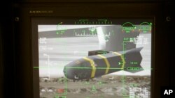 FILE - An unmanned aerial vehicle's Predator Hellfire missile is shown on a simulator's virtual camera.