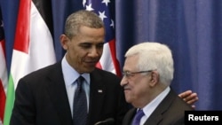 U.S. President Barack Obama participates in a joint news conference with Palestinian President Mahmoud Abbas at the Muqata Presidential Compound in Ramallah, March 21, 2013.