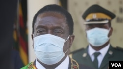 Zimbabwe President Emmerson Mnangagwa, in a televised address Nov. 30, 2021 in Harare, said the government was closely monitoring what he called an 'ominous development' following the discovery of the omicron variant in neighboring South Africa. (Columbu