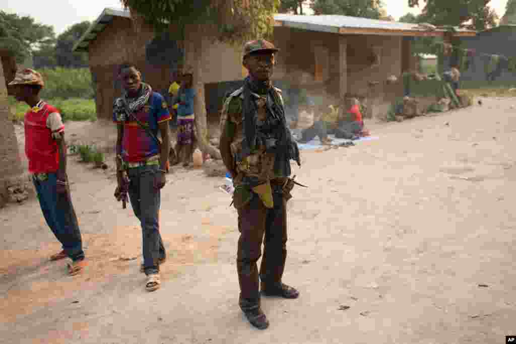 Militiamen stand in one of their bases near Mpoko Airport in Bangui, Jan. 9, 2014. 