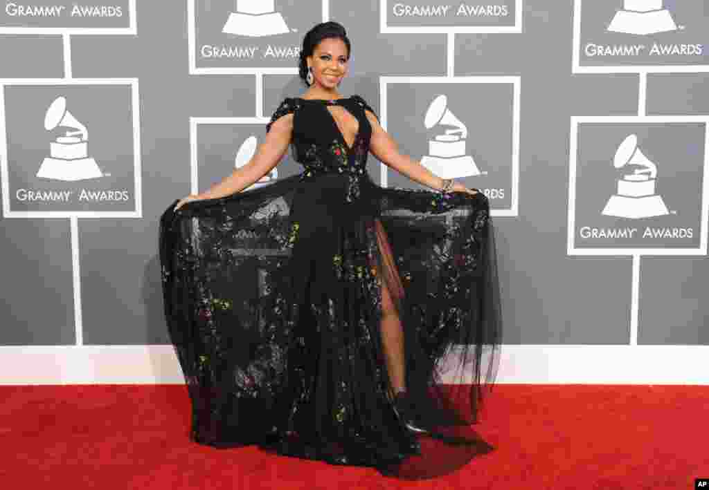 Ashanti arrives at the 55th annual Grammy Awards on Sunday, Feb. 10, 2013, in Los Angeles.