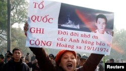 Hình ảnh tử sĩ Ngụy Văn Thà trong buổi biểu tình chống Trung Quốc ở Hà Nội năm 2014.