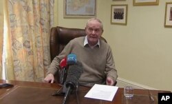 In this image taken from video, Deputy First Minister Martin McGuinness announces his resignation, Monday Jan. 9, 2017, with the declared intention to trigger early elections in the province.