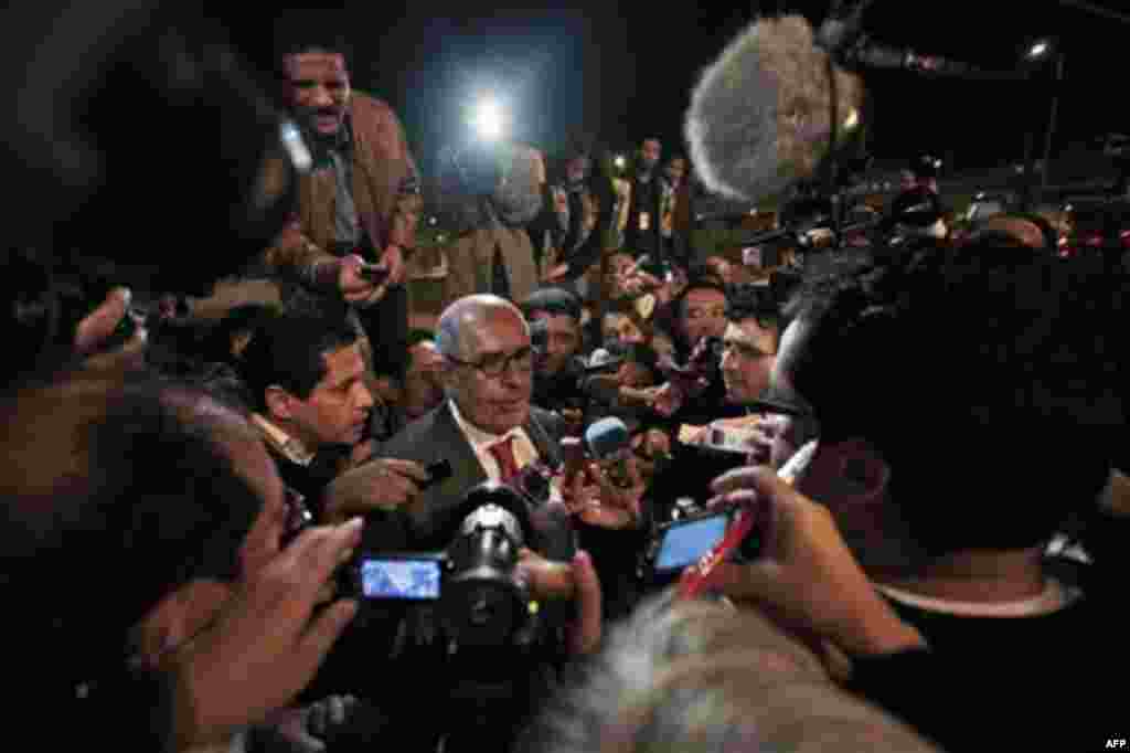 Former Director General of the International Atomic Energy Agency, IAEA, and Nobel Peace Prize winner Mohamed ElBaradei talks to members of the media as he arrives at Cairo's airport in Egypt, from Austria, Thursday, Jan. 27, 2011. ElBaradei told reporter