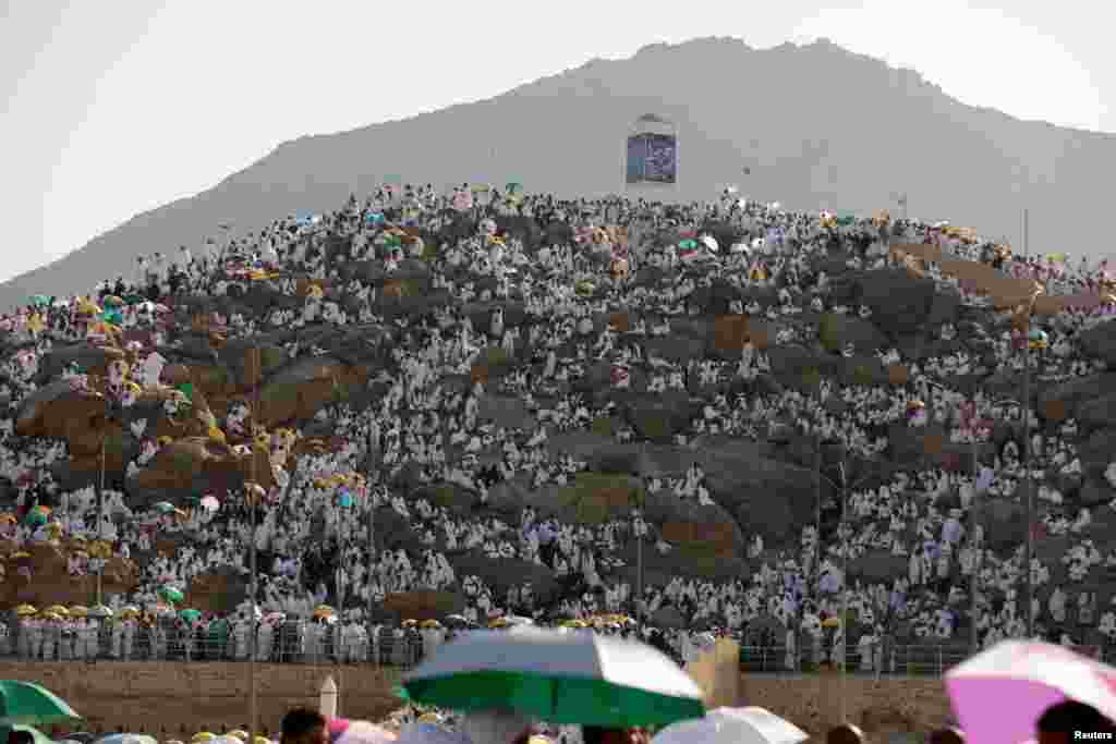 Muslim pilgrims gather on Mount Mercy on the plains of Arafat during the annual haj pilgrimage, outside the holy city of Mecca, Saudi Arabia.