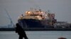 FILE - A liquefied natural gas (LNG) tanker is moored at a thermal power station in Futtsu, east of Tokyo, Feb. 8, 2017. 