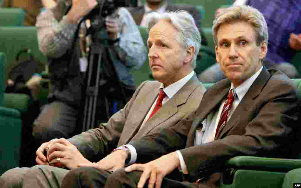 British and US envoys to Libyan rebels Christopher Prentice (L) and Chris Stevens attend a press conference of Libyan rebel leader Mustafa Abdul Jalil (not pictured) after his meeting with African head of states, in the eastern rebel stronghold of Benghazi.