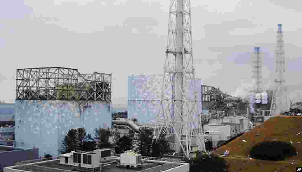 In this image released by Tokyo Electric Power Company, smoke billows from the No. 3 unit at Fukushima Dai-ichi, northeastern Japan, on March 15, 2011. (AP)