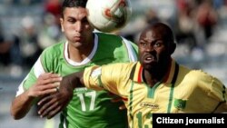 Former Warriors star striker, Adam Ndlovu (right)