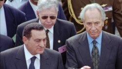 Hosni Mubara akiwa pamoja na waziri mkuu wa Israel Shimon Peres