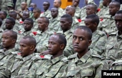 FILE - Somali soldiers attend a training session during the opening ceremony of a Turkish military base in Mogadishu, Somalia, Sept. 30, 2017.