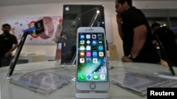 An iPhone is seen on display at a kiosk at an Apple reseller store in Mumbai, India, Jan. 12, 2017.