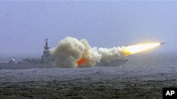 A destroyer of the South China Sea Fleet of the Chinese Navy fire a missile during a training in South China Sea, (File)