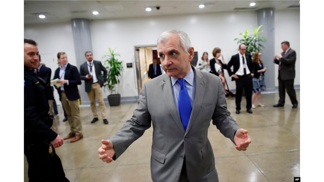 Sen. Jack Reed, D-R.I., responds to a reporter's question on Capitol Hill, Oct. 3, 2018 in Washington.