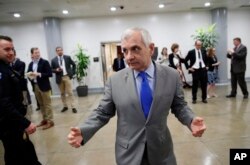 Sen. Jack Reed, D-R.I., responds to a reporter's question on Capitol Hill, Oct. 3, 2018 in Washington.